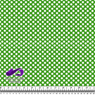 Green fabric with evenly spaced white polka dots