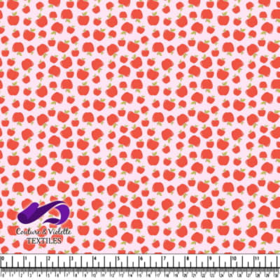 Red apple pattern on light pink background