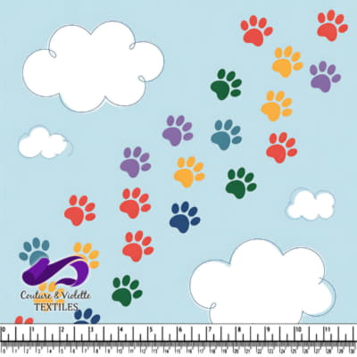 Motif coloré de traces de pattes sur fond bleu clair