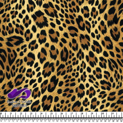 Leopard print animal pattern fabric with black and brown spots