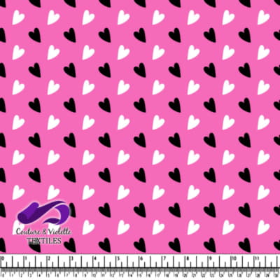 Black and White Hearts Pattern on Pink Background Textile Design