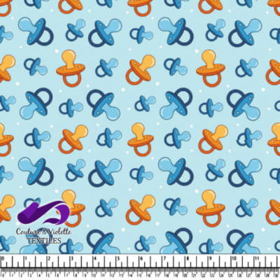 Motif de Sucette Bébé sur Fond Bleu